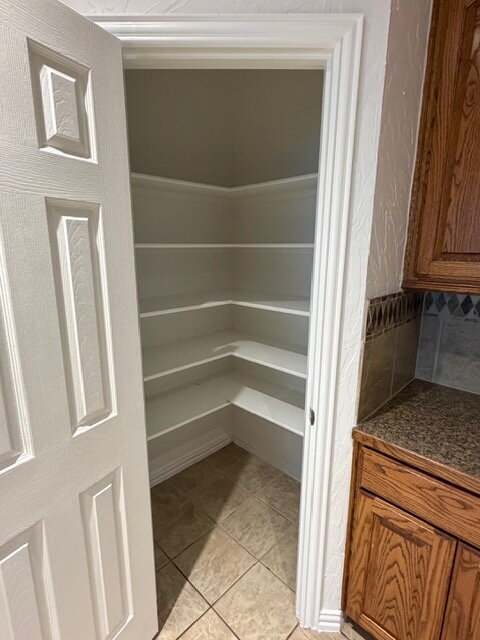 Building Photo - Former model home on corner lot is ready for move in!