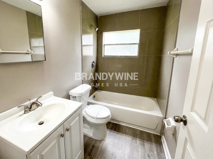 Building Photo - 8409 Red Holly Ln