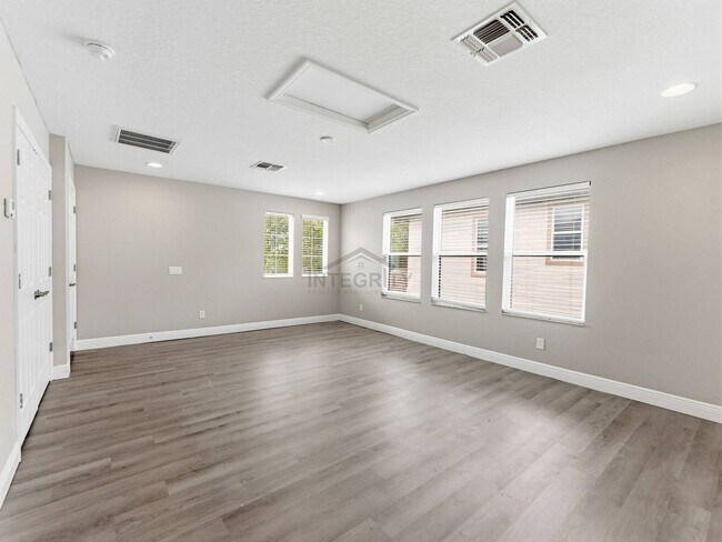 Building Photo - 8947 Garden Party Dr