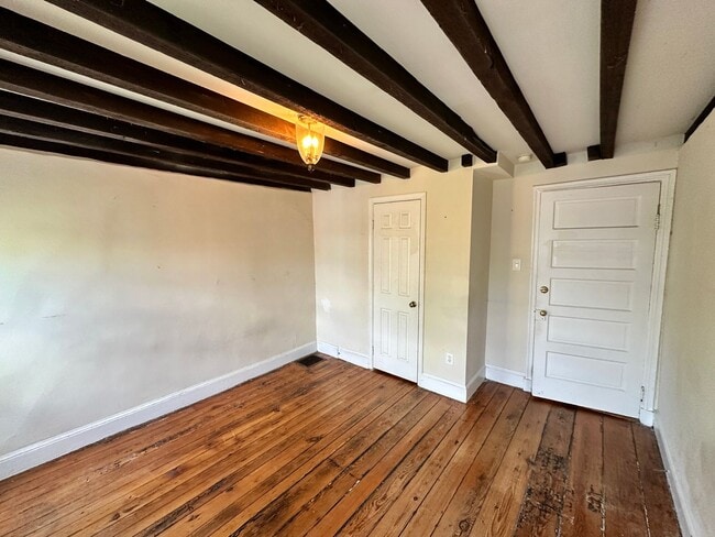 Building Photo - Glamorous Georgetown 2 Bedroom 1 Bath Historic Row Home with Patio -East Village
