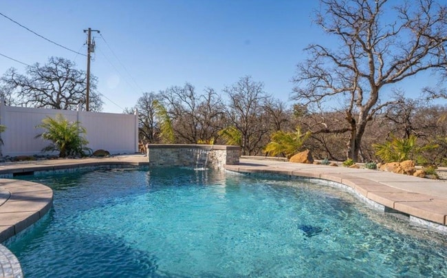 Building Photo - A Private Oasis with Unmatched Amenities 4...