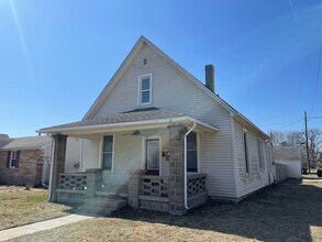 Building Photo - Three Bedroom House