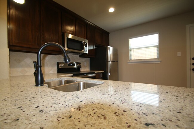 Building Photo - 1301-1305 White Sand Dr.