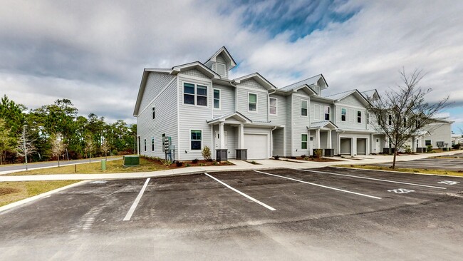 Building Photo - End unit!  Washer/Dryer Included! Beautiful 3 Bedroom Townhome (larger floorpan) with Screened-In...