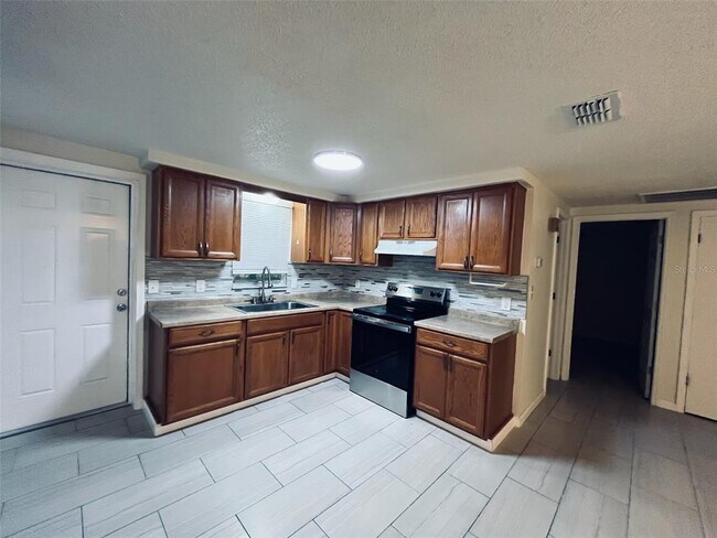 Building Photo - 5323 Satsuma Dr