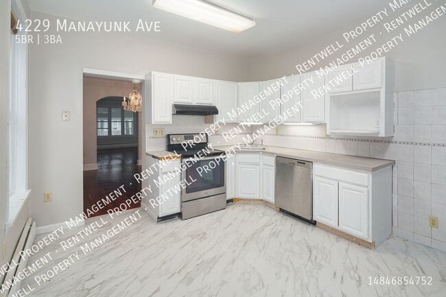 Building Photo - 5BR 2.5 BA_ 2,000 Sq Ft. Townhome in Manay...