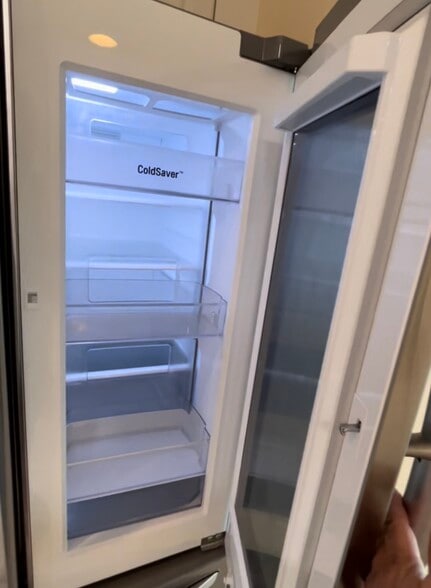 Built-in mini fridge - 2743 1st St
