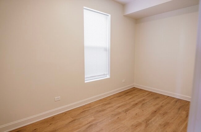 Building Photo - 6613 S Vernon Ave