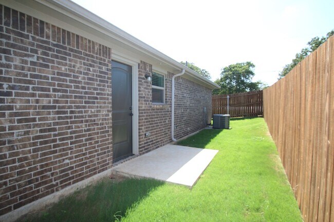 Building Photo - 1309-1313 White Sand Dr.