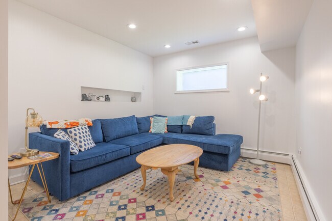 Family Room with Projector and Queen Fold Out Sofa - 275 Kimberly Ave