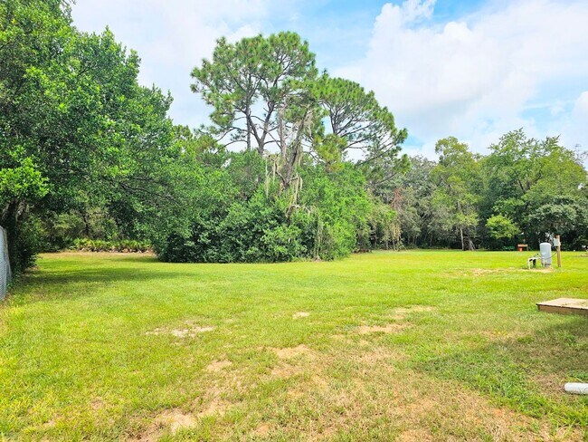 Building Photo - Welcome Home! Spacious 3-Bed, 2-Bath Split Floor Plan on ¾ Acre Lot