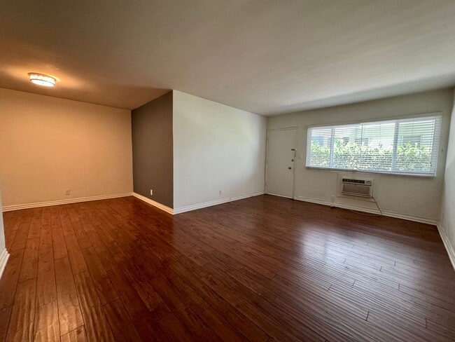 Building Photo - Updated Lower apartment with Hardwood Floo...