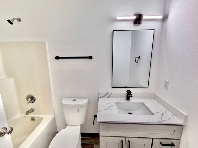 Building Photo - Spacious, remodeled two-level duplex