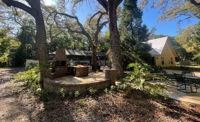 Building Photo - Welcome to this private retreat offering the perfect blend of luxury space and outdoor living.