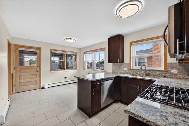 Building Photo - 8312 W Summerdale Ave