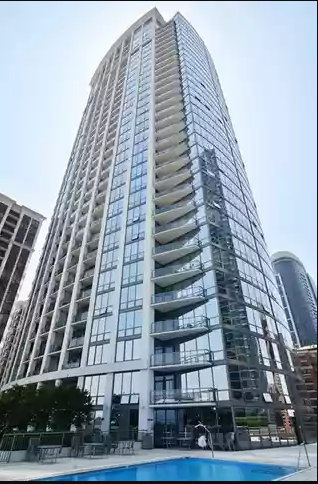 Exterior from pool area - 1235 S PRAIRIE Ave