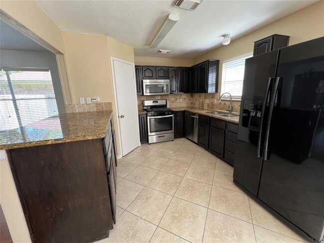 Building Photo - 8411 Tamayo Dr