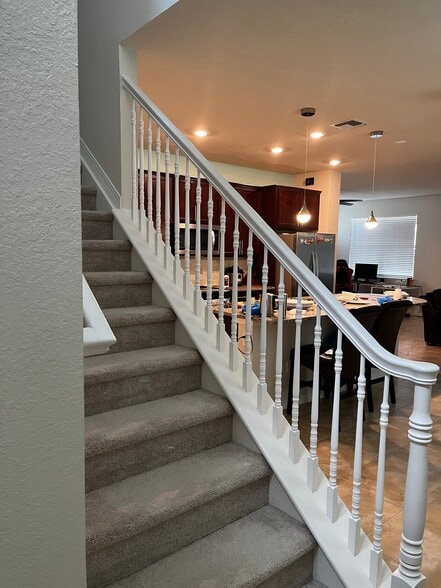 Stairs to second level - 1418 Evergreen Ter