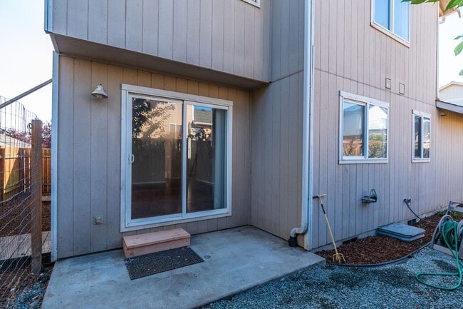 Building Photo - Spacious 4-Bedroom Home with Cozy Backyard...
