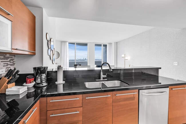 Building Photo - 141 NE 3rd Ave