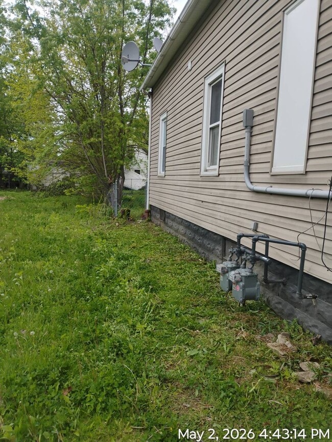 Building Photo - 6015 Hosmer Ave