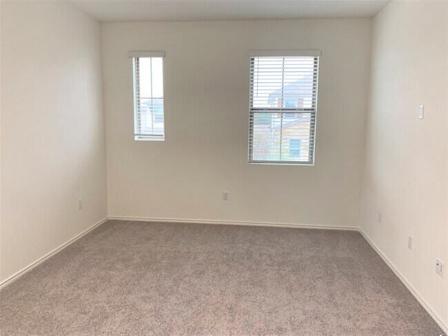 Building Photo - Home in The Village at Wells Branch