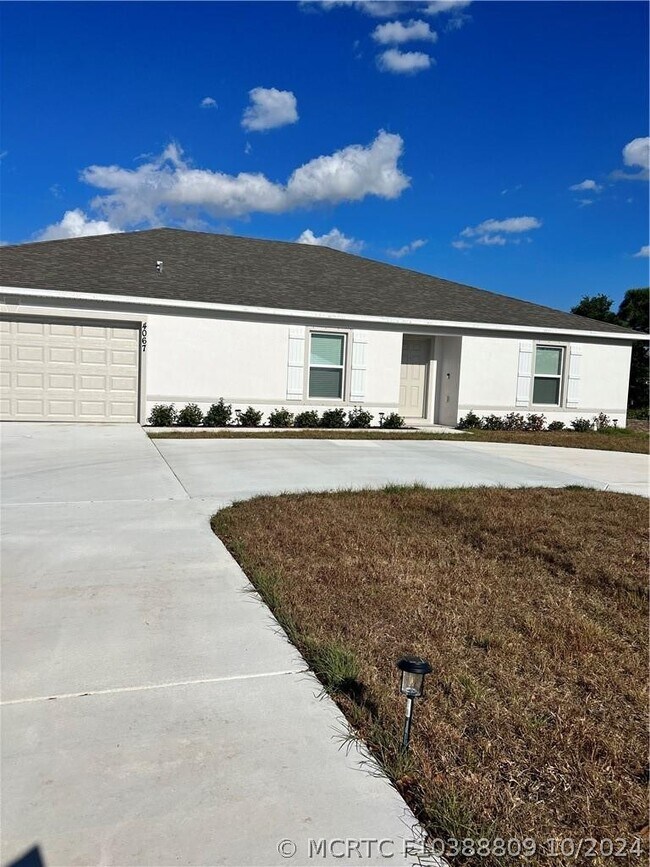 Building Photo - 4067 SW Port St Lucie Blvd