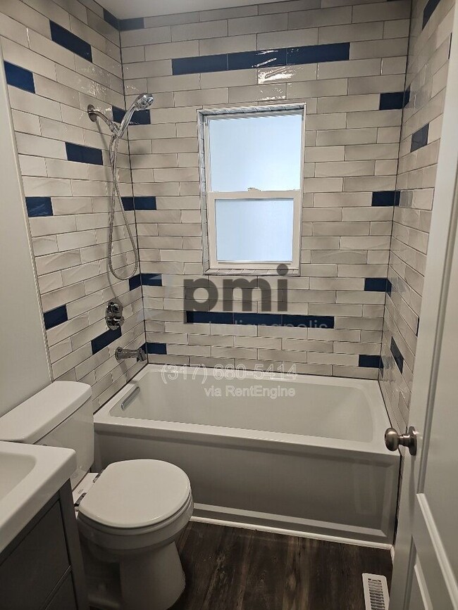 Building Photo - 7056 Caroline Ave