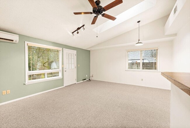 Building Photo - Charming Tacoma Home with A/C, RV Parking, Workshop & Skylit Living Room