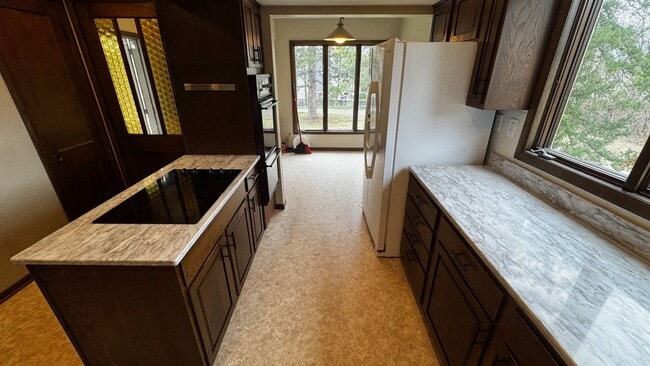 Building Photo - Wonderful 4BR 3BA w/ 2 Car Garage on 1.38 Acres in desirable Mendota Heights neighborhood!