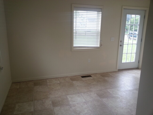 dining area and rear door - 400 East 8th Street