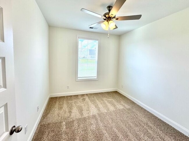Building Photo - OPEN HOUSE! Move In Special! Brand New 4-b...