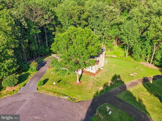 Building Photo - 10899 Woodland Falls Dr