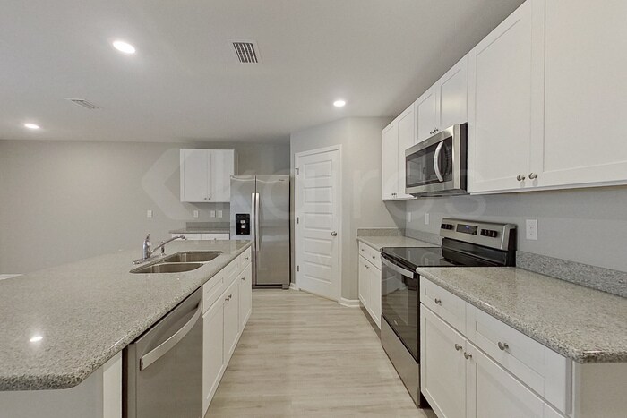 Building Photo - 4628 Malay Cir