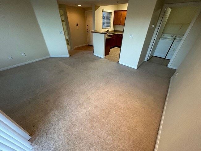 Building Photo - ADORABLE 2 BEDROOM 2 BATHROOM CONDO LOCATED IN A GATED COMMUNITY