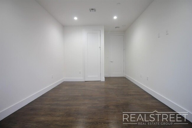 Building Photo - Stunning Giant New 2 BED with GARAGE & W/D...