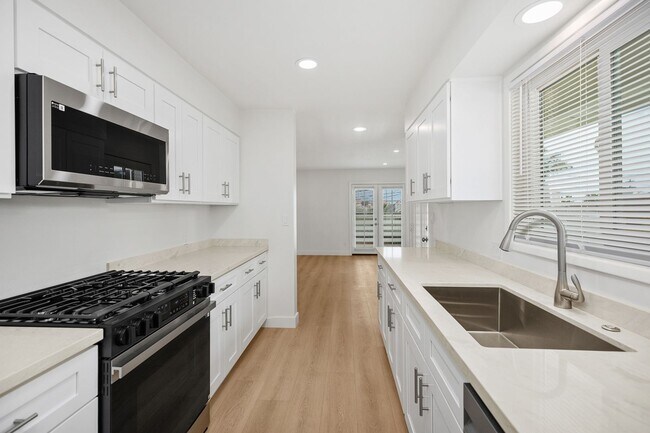 Building Photo - Coastal Living at Its Finest! Fully Remodeled!