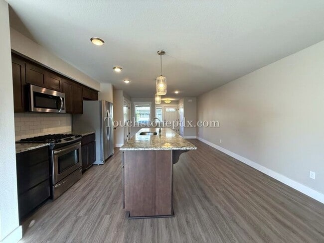 Building Photo - Modern Open Concept 3 Bedroom Home with Balcony and Attached Garage