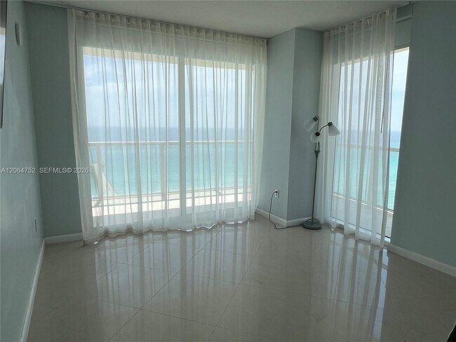 Building Photo - 16699 Collins Ave