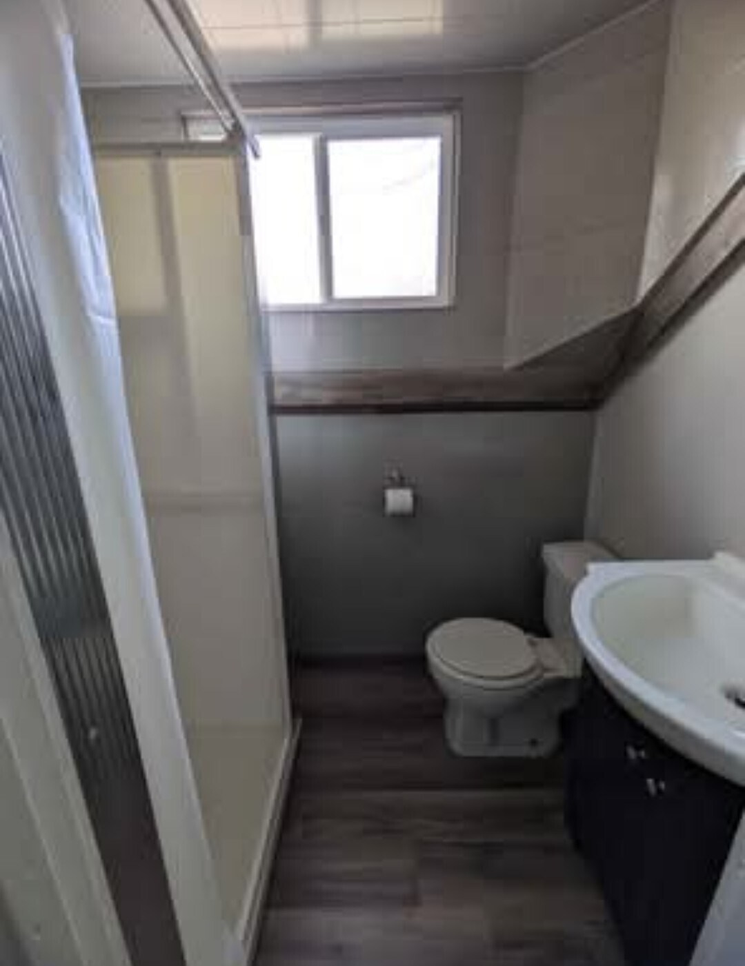 Full shower and storage area - 109 E North St