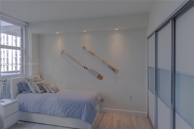 Building Photo - 10275 Collins Ave