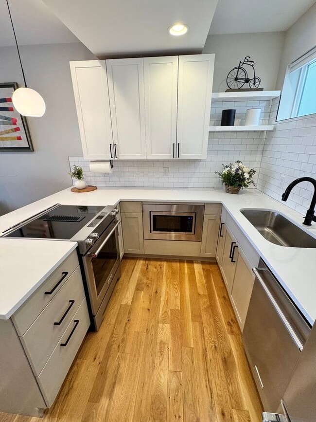 Building Photo - 1788 W 32nd Ave