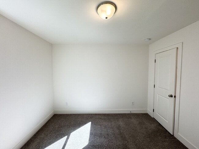 Building Photo - Stylish 3BR Townhome with Private Yard & T...