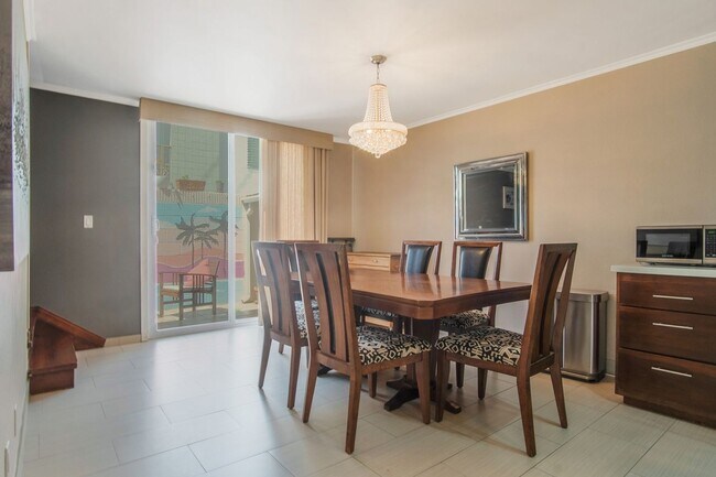 Building Photo - Renovated three-bedroom, three-bath 2-stor...