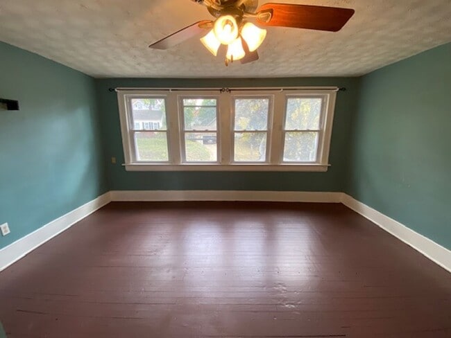 Building Photo - Fenced Yard + Porch in Goodyear Heights—3B...