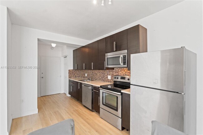 Building Photo - 7135 Collins Ave