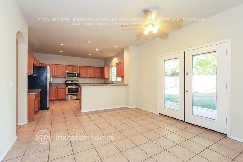 Building Photo - 8228 W Harmony Ln