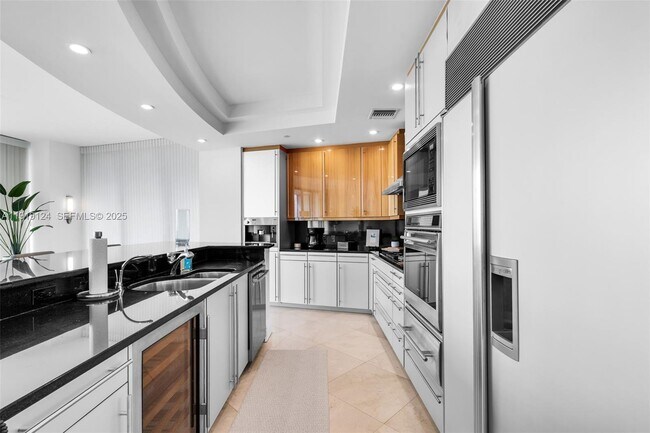 Building Photo - 10295 Collins Ave