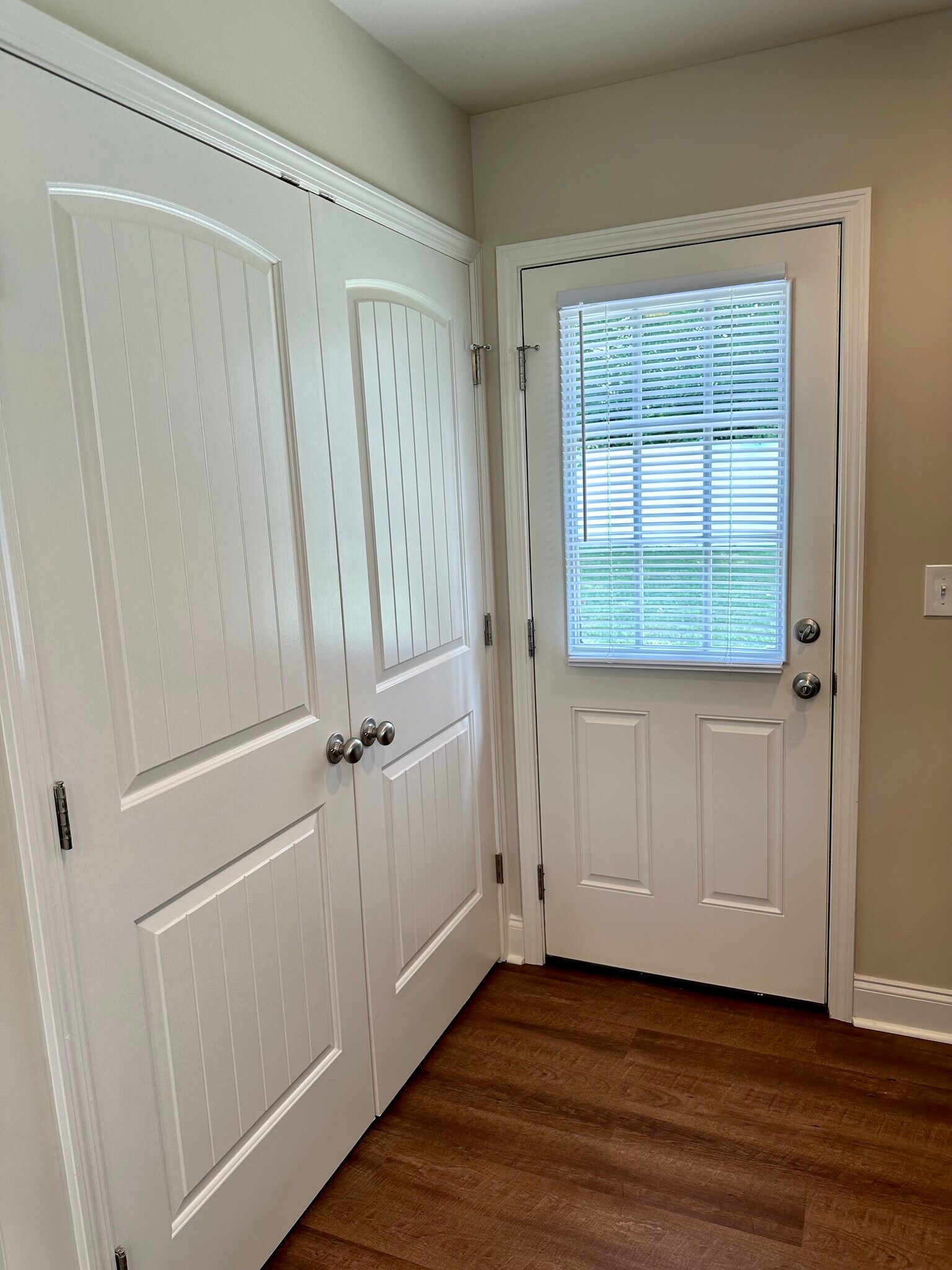 Double door laundry area, door to rear patio - 891 Old Vinton Mill Rd NE Unit B