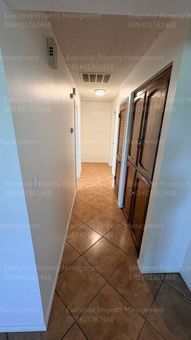 Building Photo - 3 bedroom 2 bathroom home on a corner lot with extra fenced parking.